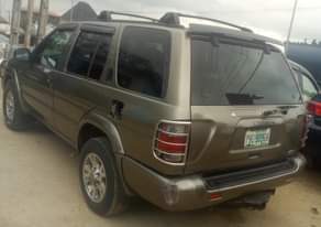 A picture of Nissan Pathfinder 2002 model Clean interior Super untouched V6 Engine