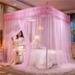 A picture of 4 stand mosquito nets