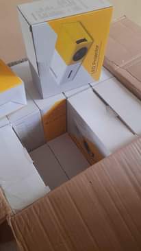 A picture of Mini projector with FREE tripod stand and anti light screen