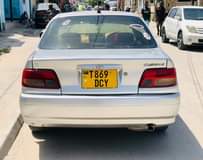A picture of TOYOTA CARINA TI NAIUZA MIL 7 7 0743435416