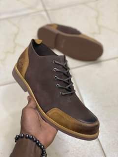 A picture of Boots with original leather cover