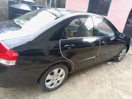 A picture of Kia EX 2008 model AC needs attention Engine and gear