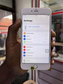 A picture of iPhone 6 Plus 64GB at Shs 210k only . Fully