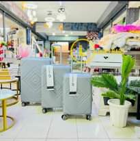 A picture of RUBBER SUITCASES
