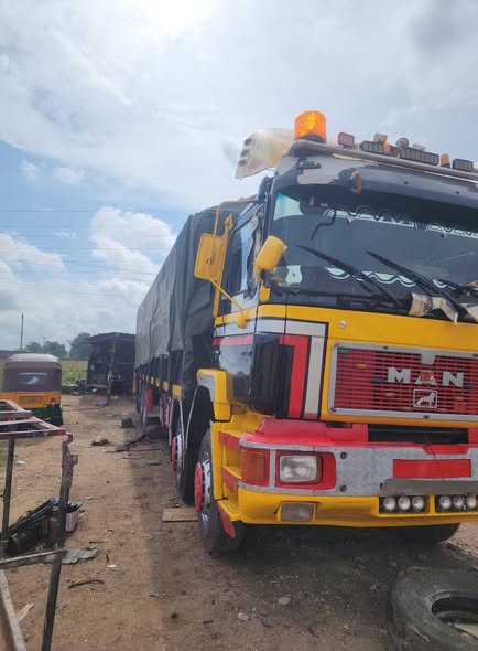 A picture of Neatly used M A N Diesel 12 tyres truck