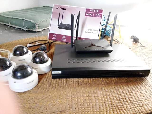 A picture of CCTV system router and 4 hikman cams