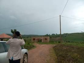 A picture of 0709106274 0774591471...TITLED PLOTS AT WAKISO GOBERO ESTATE 50X100FT 15M UGX