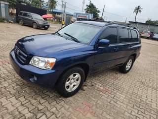 A picture of TOKUBO STANDARD USED TOYOTA HIGHLANDER UPGRADED TO 2005 DIRECT OWNER