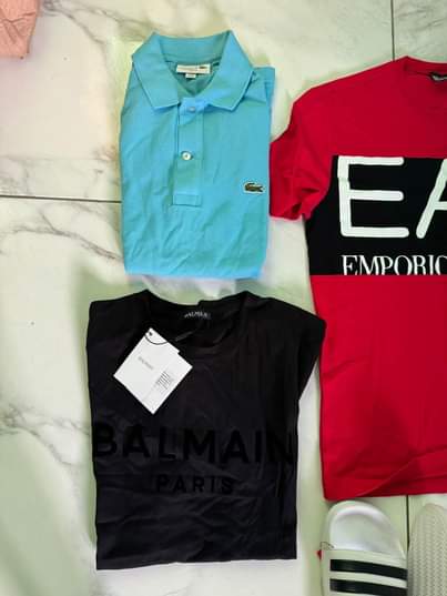A picture of Genuine Authentic Mens Tshirts and slides
