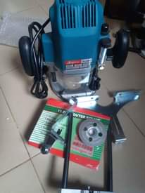 A picture of Wood router and 15 pcs of routers bits set