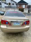 A picture of Toyota corolla 2006 Gold Colour blue Condition Nigerian Used pure