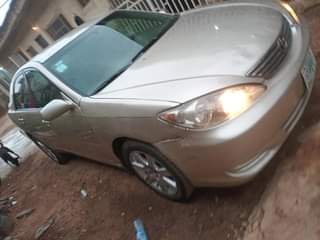 A picture of Toyota Camry 2004 model 4plugs FIRSTBODY Perfectly working and very
