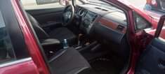 A picture of Nissan Tilda 2010 engine gear and ac100 price 2 4m