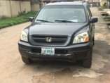 A picture of Up for Grabs 2004 Honda pilot Sharp as seen in