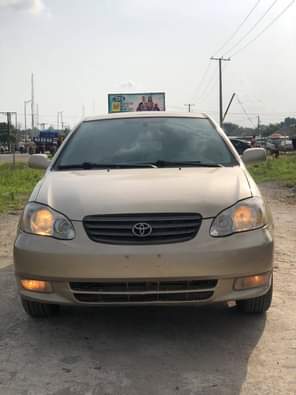 A picture of Golden A Neatly Used Toyota Corolla Le 2003 Model With