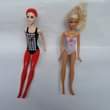 A picture of Barbie dolls
