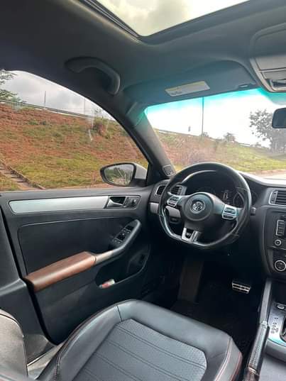A picture of 2014 VOLKSWAGEN PASSAT GLI SLIGHTLY USED
