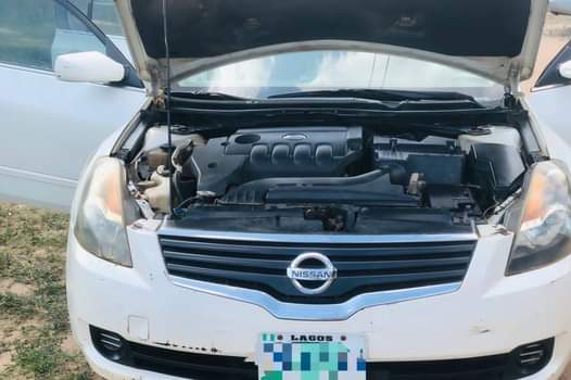 A picture of Nisan Optima 20007 model very clean first body pan engine