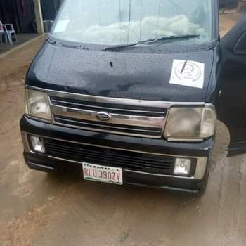 A picture of Delears market Keke bus first body hijet Automatic bought last