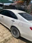 A picture of Es 350 08 model Tesla screen reverse camera location jakande