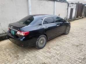 A picture of Sharp clean Toyota corolla 2013 model Buy n drive nothing