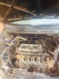 A picture of Toyota Corolla 06 model frst body with very low fuel