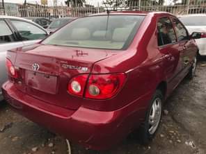 A picture of Features 2005 Wine Corolla CE 1 8l i4 engine Automatic