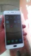 A picture of Oppo f1s 32gb 3gb ram small crack working fine