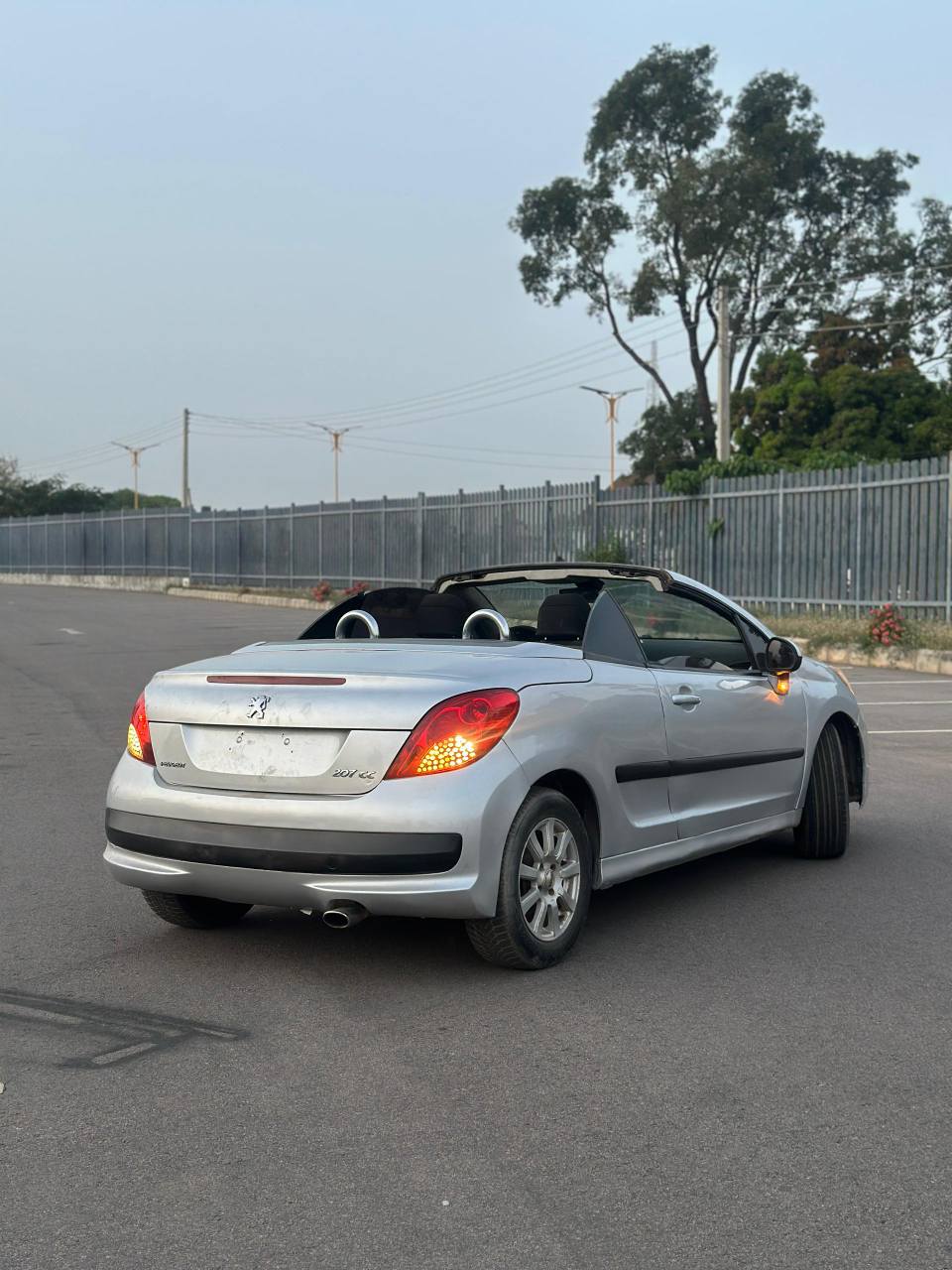 A picture of AWOOF DEAL Another banga SUPER CLEAN USED Peugeot 207cc 2009
