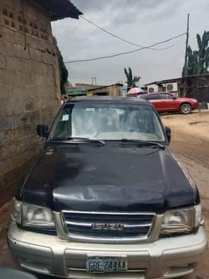 A picture of Isuzu jeep for sale engine and gear is ok..The car