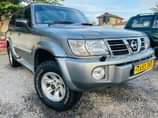 A picture of Price Bei38 5mil Call 0658056651 Nissan Patrol Grey In Colour