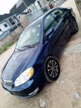 A picture of Toyota Corolla 2007 model buy Nd drive location Lagos going