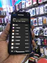A picture of iPhone X 256gb storage Working Face ID 100 battery health