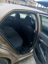 A picture of Awoof Awoof Awoof Registered 2010 Corolla LE fabric seat keystart