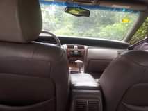 A picture of Toyota Avalon dashboard in pristine condition buy and drive Aba