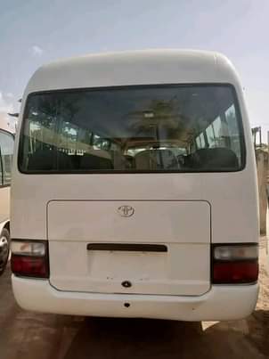 A picture of White Toyota coaster bus...3RZ engine...year 2015...AC working perfectly... price 22m