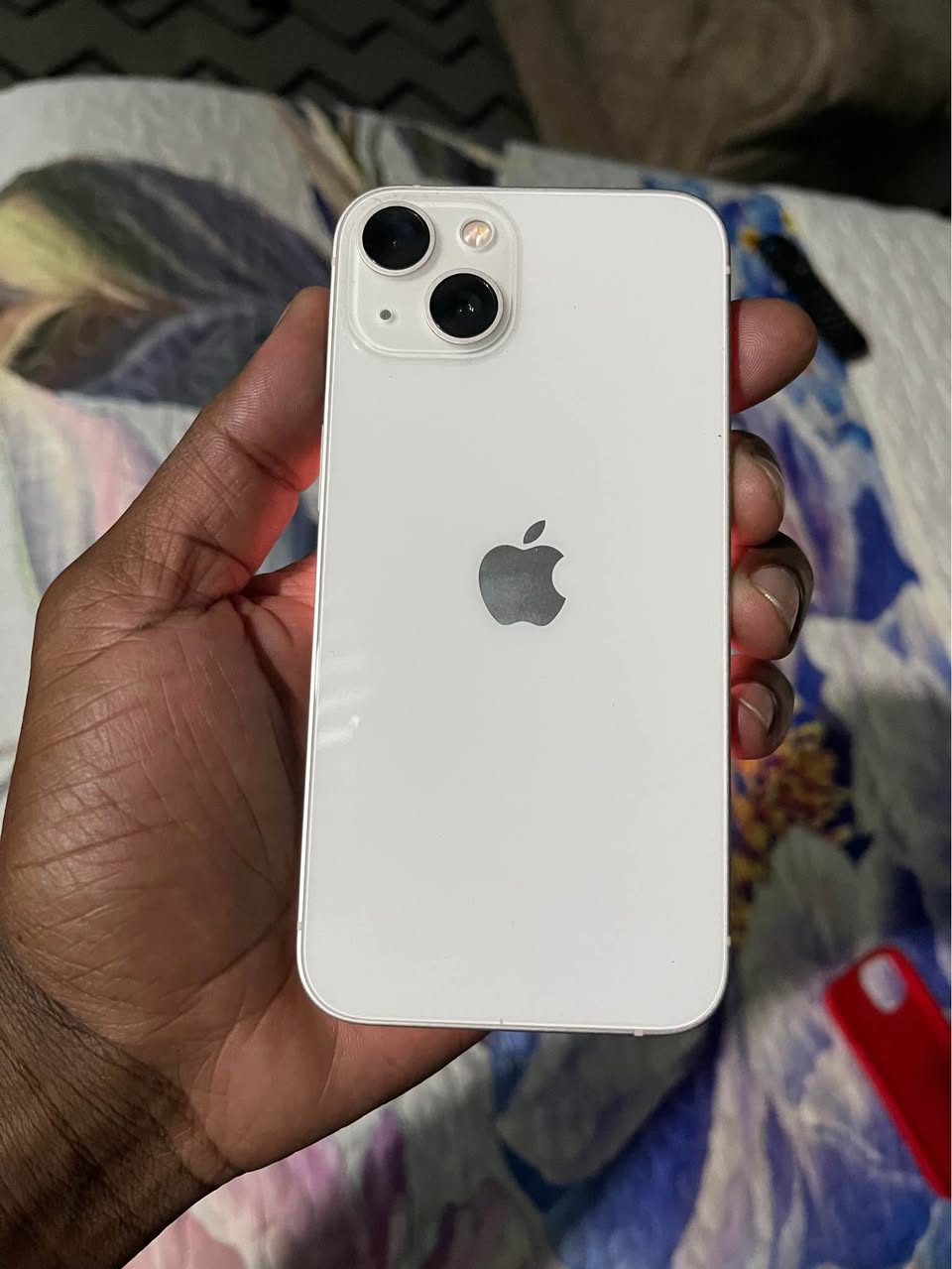 A picture of iPhone 13 normal 128gig battery 100 all network