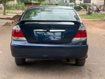 A picture of AWOOF AWOOF AWOOF TOYOTA CAMRY 04 V6