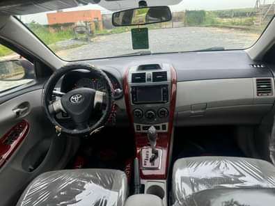 A picture of WOW This is premium standard Toyota Corolla 2013 model registered