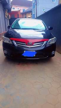 A picture of Toyota Corolla 2011 model. Owner needs money urgently and nothing