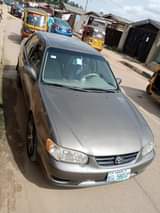 A picture of Toyota Corolla 1999 Okerejuowo lo First body Papers fully complete