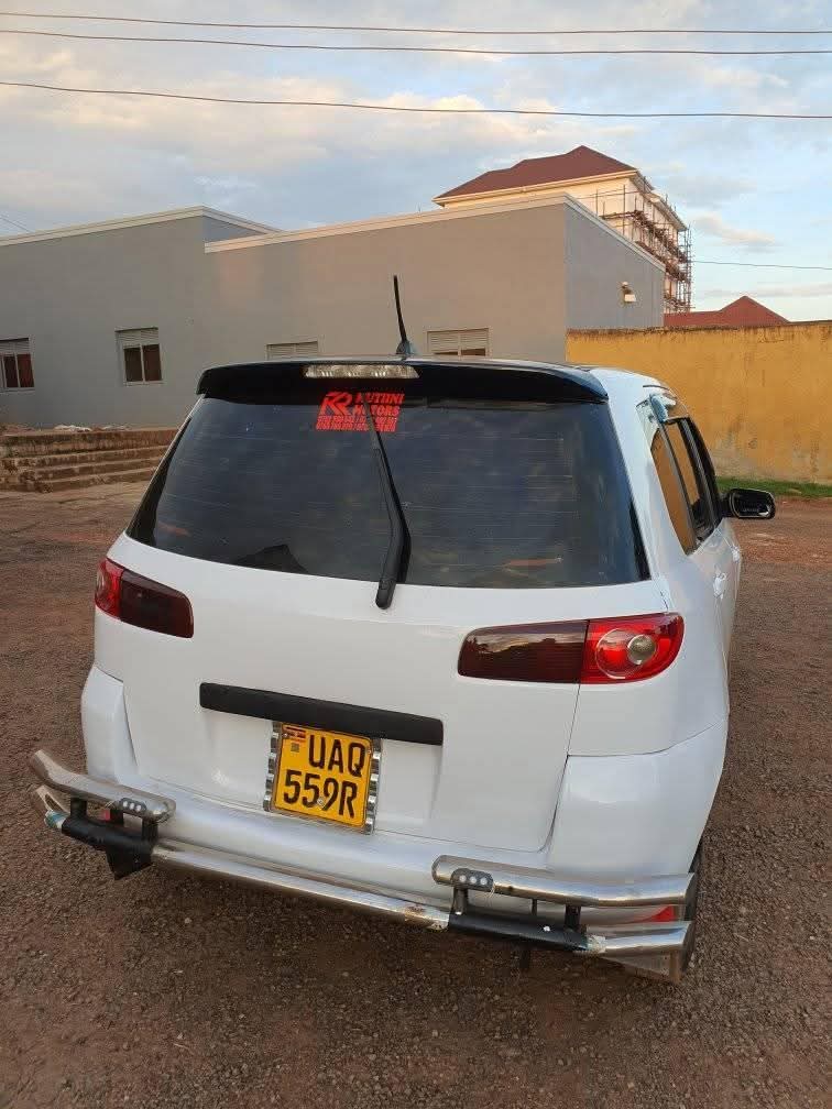 A picture of 2003 Mazda demio