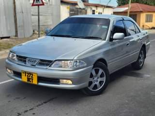 A picture of TOYOTA CARINA TI BEI MILIONI 7 8 MWENYEWE ANA SHIDA