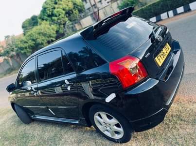 A picture of FOREIGN USED TOYOTO COROLLA OBAMA
