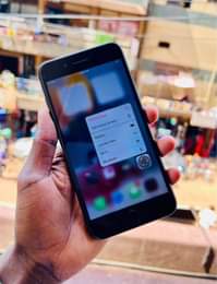 A picture of iPhone 7plus 32gb 100 battery health. Clear cameras at just
