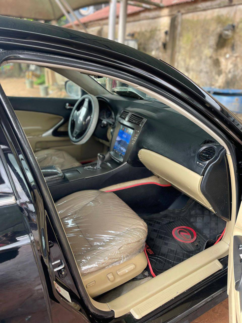 A picture of Dealers deal lexus IS250 2007 with tesla screen.buy and maintain..going