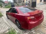 A picture of Registered 2013 Camry sport Red color Baked Engine ac and