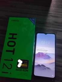 A picture of Infinix hot 12i bado mpya na box lake CHaji siku