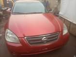 A picture of Very neat used Nissan Altima 4 plugs