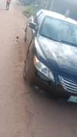 A picture of Sharp 2006 toyota voltron with 4plugs engine black colour